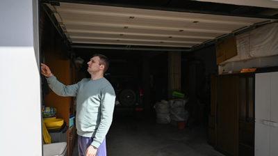 man worried about his garage door